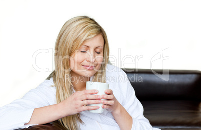 Relaxed woman enjoy her coffee