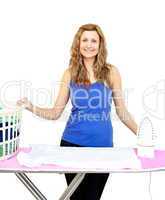 Beautiful woman behind an ironing board