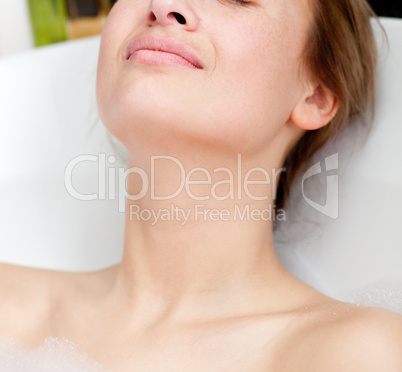 Relaxed woman having a bath