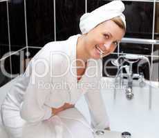Laughing woman is having a bath