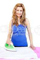 Cute woman ironing