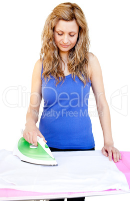 Handsome woman ironing her clothes