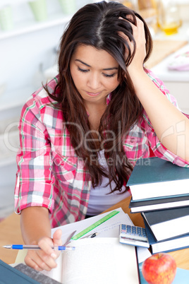 Stressed student doing her homework