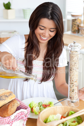 Attractive woman prepare a salad