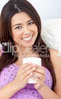 Beautiful woman holding a cup of coffee