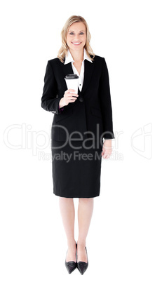 A happy businesswoman holding a cup of cofffe
