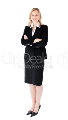 A confident businesswoman with folded arms A confident businesswoman with folded arms