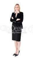 A confident businesswoman with folded arms