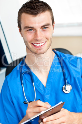 Self-assured doctor holding a clipboard and carrying a stethosco