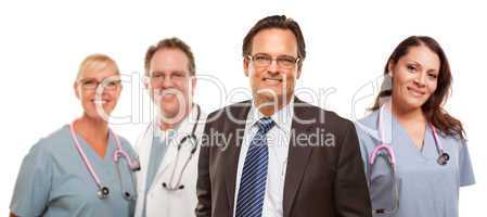 Smiling Businessman with Male and Female Doctors and Nurses
