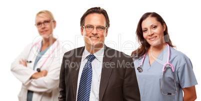 Smiling Businessman with Female Doctor and Nurse