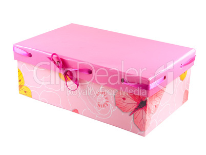 Pink gift box with ribbon isolated on white