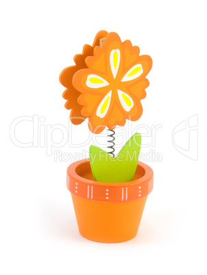 Toy on a spring flower in a pot