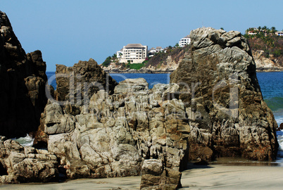 Rocks on beach in Puerto Escondido, Mexico