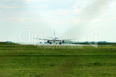 Small airplane waiting on the field