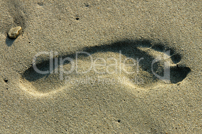 Footprint in sand in Puerto Escondido, Mexico