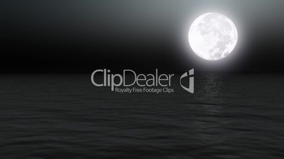 Full moon over calm sea at night