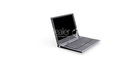 Laptop spinning on white background - Loopable