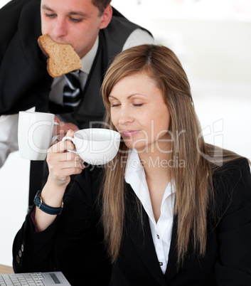 Pretty businesswoman enjoy her coffee in the morning