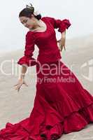 Traditional Woman Spanish Flamenco Dancer In Red Dress With Fan