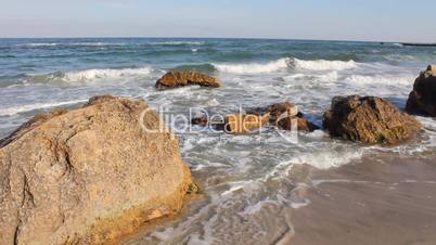 Sea waves on the rocky shoreline (Full HD)