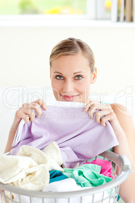 Cute young woman doing housework