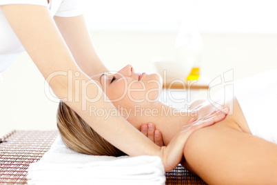 Portrait of a caucasian young woman having a massage