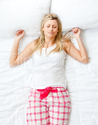Nice woman lying in bed