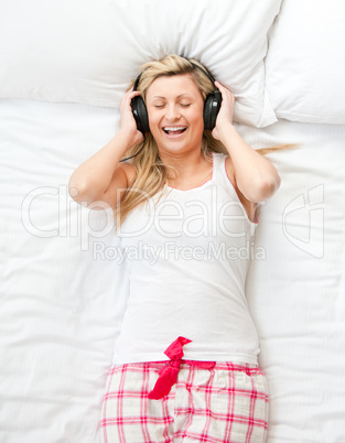 Nice woman lying in bed