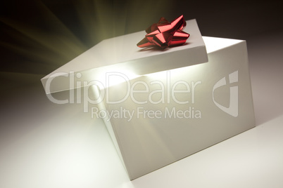 Red Bow Gift Box Lid Showing Very Bright Contents