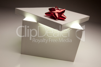 Red Bow Gift Box Lid Showing Very Bright Contents