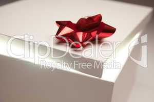Red Bow Gift Box Lid Showing Very Bright Contents
