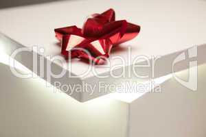 Red Bow Gift Box Lid Showing Very Bright Contents