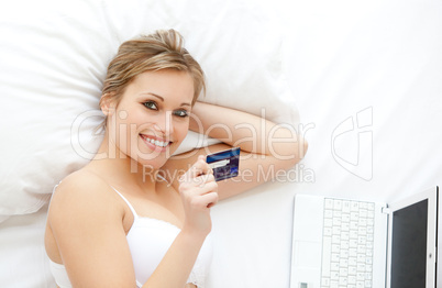 Cute woman in front of her laptop