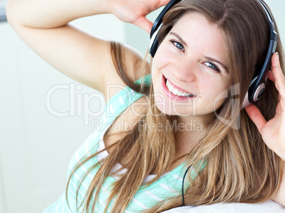 Charming girl listening to music