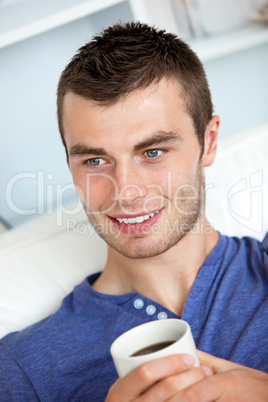 Attractive man drinking a coffee