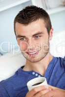 Attractive man drinking a coffee