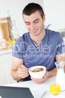 Happy man having breakfast