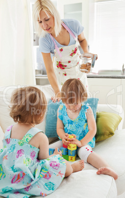 Woman playing with her daughters