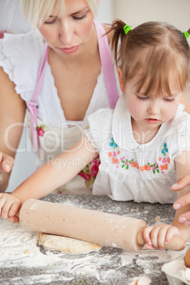 Concentrated mother and child baking cookies