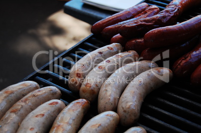 sausages on the grill