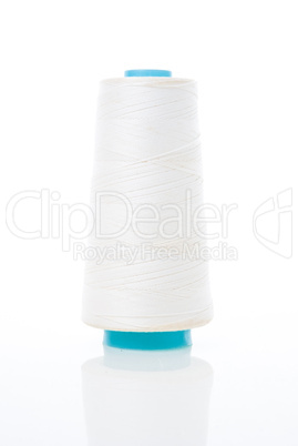 Bobbin of white thread