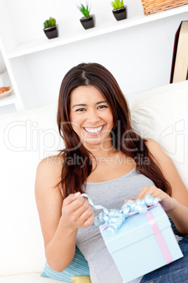 Funny woman holding a present