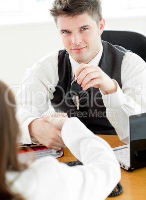 Young businessman shaking hands
