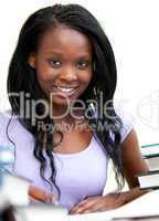Afro-american woman studying at home