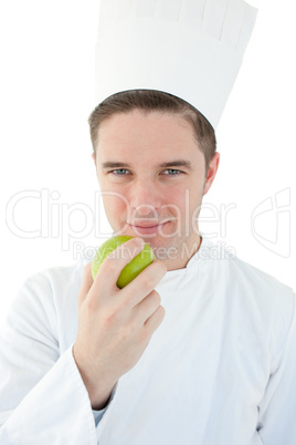 Cook holding a green apple
