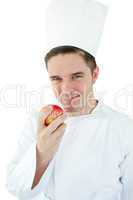 Cook holding an apple
