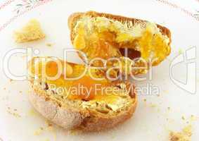 Bread with butter and honey or marmalade