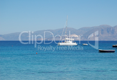 Recreation yacht and turquoise sea, Crete, Greece