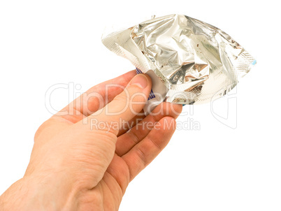 Crumpled wrapper in hand
